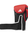 A red and black boxing glove, Tilt 350 PRO Training model.