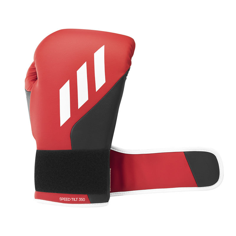 A red and black boxing glove, Tilt 350 PRO Training model.