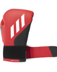 A red and black boxing glove, Tilt 350 PRO Training model.