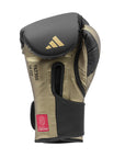 Single white and gold Tilt 350 PRO training boxing glove in 16 oz size.