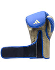 Blue and gold boxing glove for training.