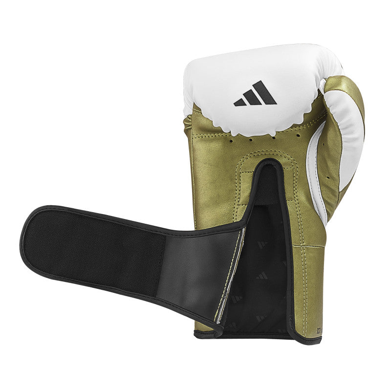 Boxing glove with a white and black strap.