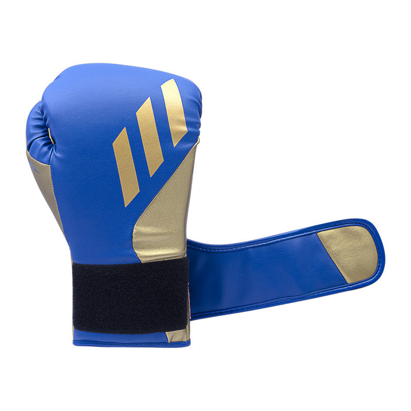 Blue and gold boxing glove for training.