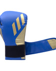 Blue and gold boxing glove for training.