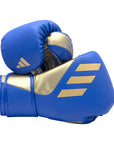 Pair of blue and gold Tilt 350 PRO Training Gloves.