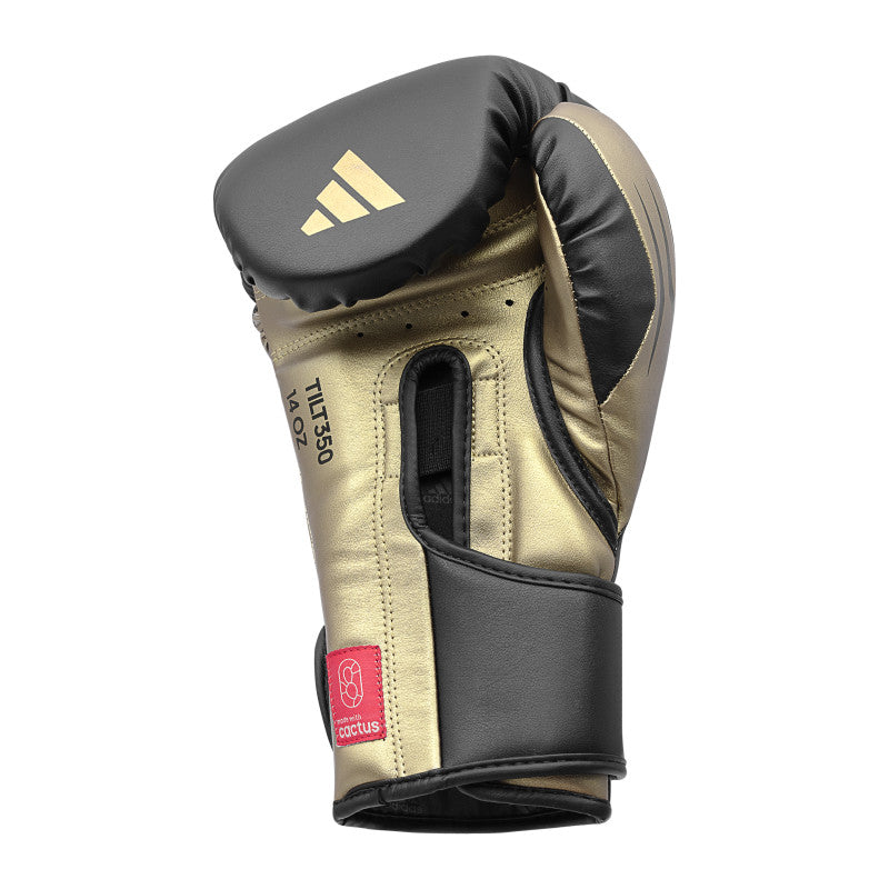 Single white and gold Tilt 350 PRO training boxing glove in 14 oz size.