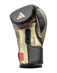 Single white and gold Tilt 350 PRO training boxing glove in 14 oz size.