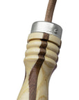 Close up of a wooden handle on a jump rope for fitness.